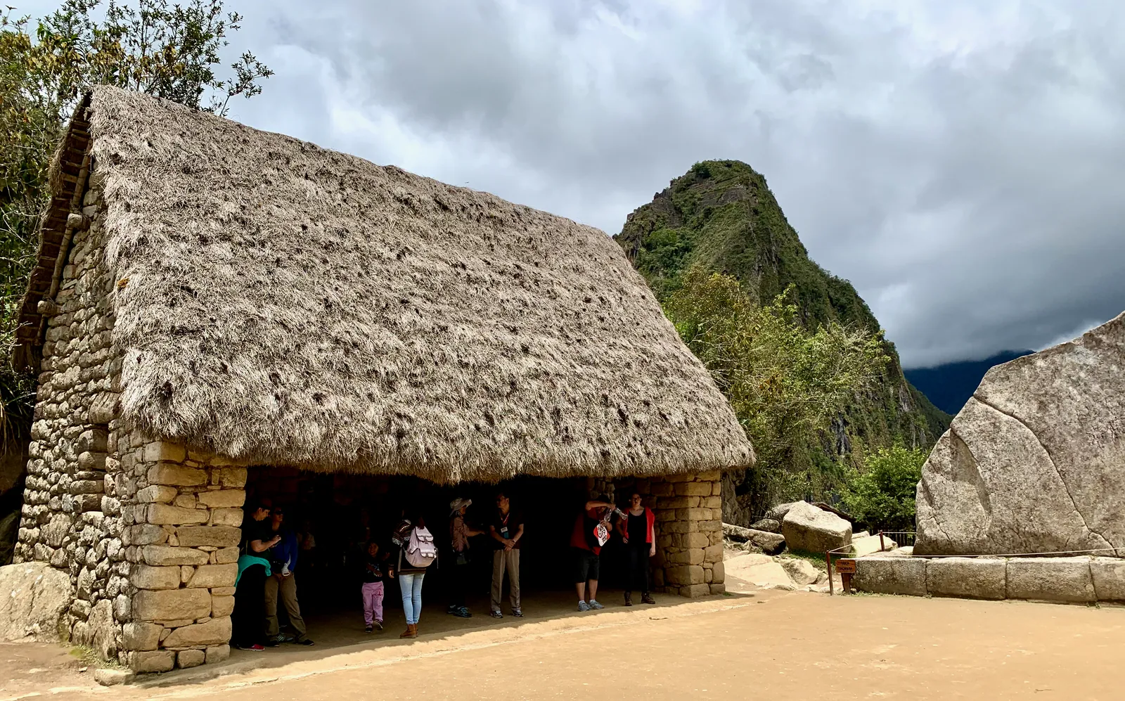 The Sacred Rock at Machu Picchu, its silhouette echoing the mountain behind