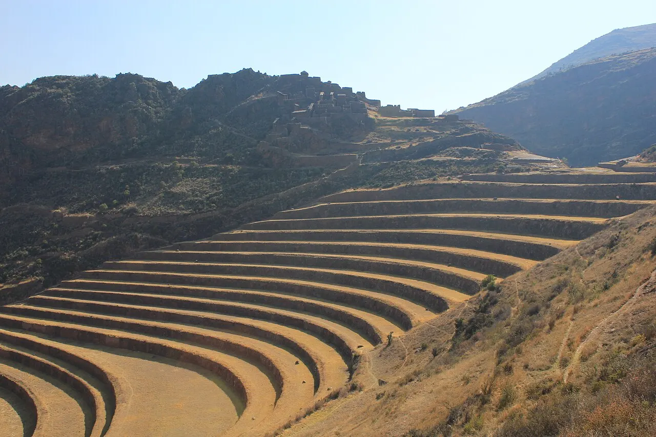 Curved Inca agricultural terraces of Pisac sweeping down the mountainside in the Sacred Valley