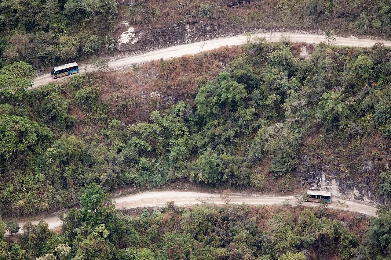 Shuttle buses climbing the switchback road up toward the Machu Picchu gate