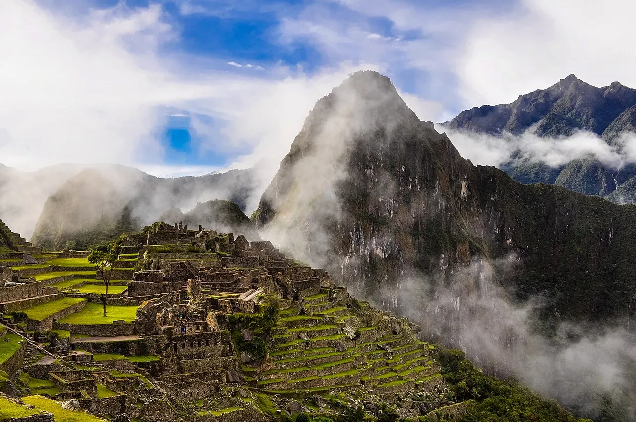 Machu Picchu emerging as the morning cloud clears around Huayna Picchu