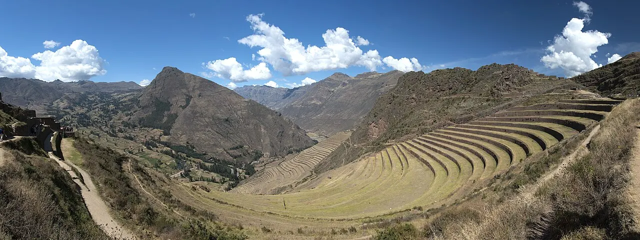 The curved agricultural terraces of Pisac sweeping down the mountainside above the valley