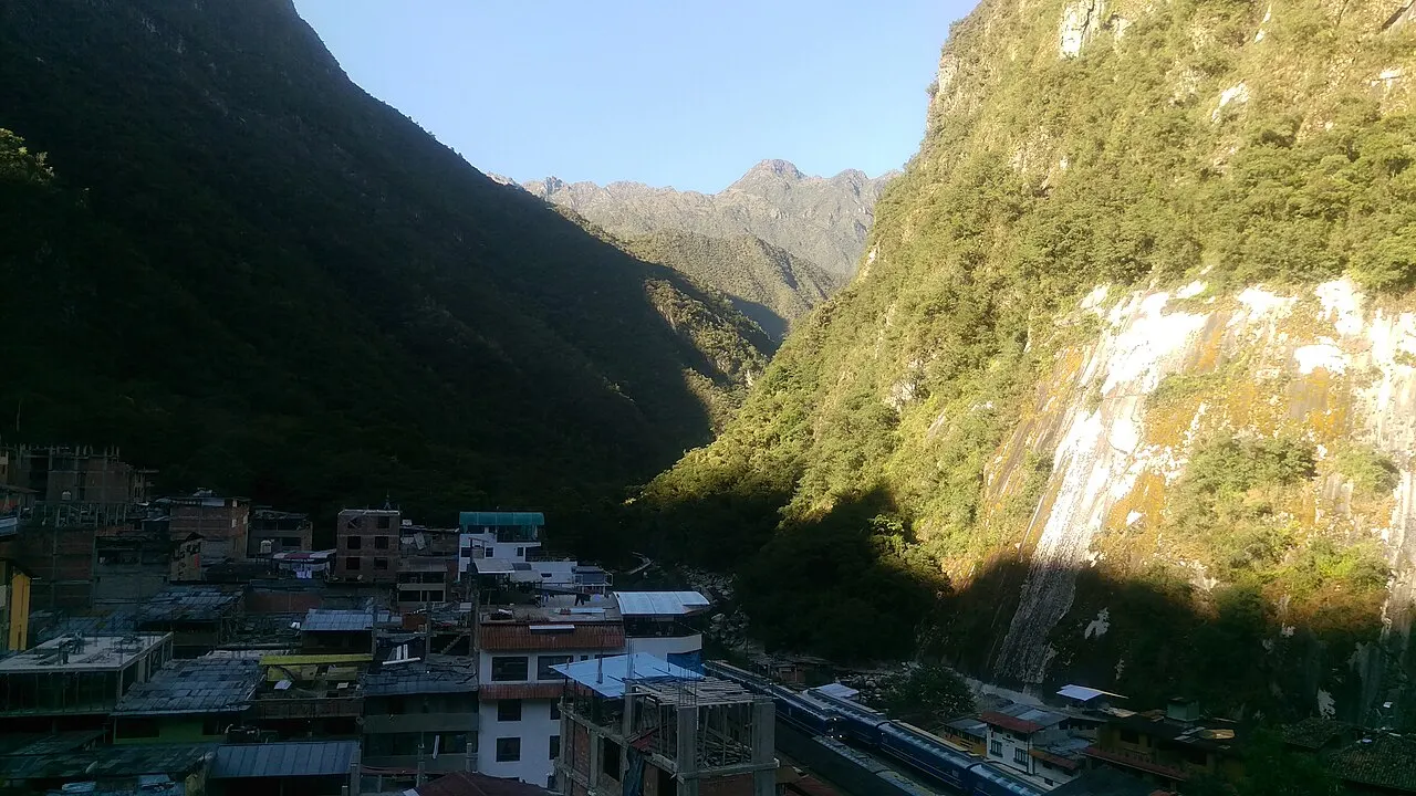 The town of Aguas Calientes in its steep cloud-forest gorge with the railway running through it